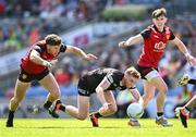 23 June 2024; Seán Carrabine of Sligo in action against Pierce Laverty, left, and Miceal Rooney of Down during the Tailteann Cup semi-final match between Sligo and Down at Croke Park in Dublin. Photo by Piaras Ó Mídheach/Sportsfile