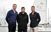 27 June 2024; Elkstone announces its sponsorship of Irish Olympic sailor Finn Lynch at Dún Laoghaire Yacht Club in Dublin. Pictured at the announcement are Irish Olympic Sailor Finn Lynch, centre, with Elkstone Head of Clients Joe Bergin, left, and Head of Staff Rob Kearney. Photo by Sam Barnes/Sportsfile