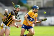 16 June 2024; Paul Rodgers of Clare in action against Larry Phelan of Kilkenny during the Electric Ireland GAA Hurling All-Ireland Minor Hurling Championship Semi-Final match between Kilkenny and Clare at FBD Semple Stadium in Thurles, Tipperary. Photo by Matt Browne/Sportsfile