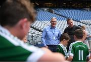 24 June 2024; Uachtarán Chumann Lúthchleas Gael Jarlath Burns, left, and former Donegal footballer Kevin Cassidy during the GAAgaeilge Go Games at Croke Park in Dublin. Photo by Shauna Clinton/Sportsfile