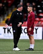 28 June 2024; Drogheda United manager Kevin Doherty, left, in conversation with Evan Weir of Drogheda United before the SSE Airtricity Men's Premier Division match between Derry City and Drogheda United at The Ryan McBride Brandywell Stadium in Derry. Photo by Ben McShane/Sportsfile