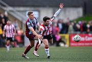 28 June 2024; Colm Whelan of Derry City in action against Jack Keaney of Drogheda United during the SSE Airtricity Men's Premier Division match between Derry City and Drogheda United at The Ryan McBride Brandywell Stadium in Derry. Photo by Ben McShane/Sportsfile