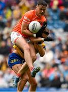 29 June 2024; Aaron McKay of Armagh in action against Conor Cox of Roscommon during the GAA Football All-Ireland Senior Championship quarter-final match between Armagh and Roscommon at Croke Park in Dublin. Photo by Harry Murphy/Sportsfile