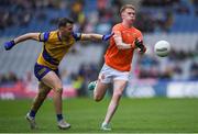 29 June 2024; Conor Turbitt of Armagh is tackled by Diarmuid Murtagh of Roscommon during the GAA Football All-Ireland Senior Championship quarter-final match between Armagh and Roscommon at Croke Park in Dublin. Photo by Shauna Clinton/Sportsfile
