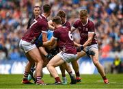29 June 2024; Jack McCaffrey of Dublin in action against four Galway players, from left, Séan Mulkerrin, Liam Silke, Séan Mulkerrin and Dylan McHugh during the GAA Football All-Ireland Senior Championship quarter-final match between Dublin and Galway at Croke Park in Dublin. Photo by Harry Murphy/Sportsfile