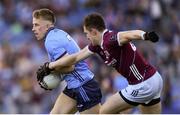 29 June 2024; Seán Bugler of Dublin is tackled by Cein Darcy of Galway during the GAA Football All-Ireland Senior Championship quarter-final match between Dublin and Galway at Croke Park in Dublin. Photo by Shauna Clinton/Sportsfile