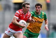 30 June 2024; Bevan Duffy of Louth in action against Daire O Baoill of Donegal during the GAA Football All-Ireland Senior Championship quarter-final match between Donegal and Louth at Croke Park in Dublin. Photo by Ben McShane/Sportsfile