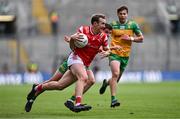 30 June 2024; Bevan Duffy of Louth in action against Daire O Baoill of Donegal during the GAA Football All-Ireland Senior Championship quarter-final match between Donegal and Louth at Croke Park in Dublin. Photo by Ben McShane/Sportsfile