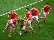 30 June 2024; Conor Grimes of Louth, supported by team-mates, from left, Anthony Williams, 6, Dermot Campbell, Dan Corcoran and Ciarán Murphy in action against Oisin Gallen of Donegal during the GAA Football All-Ireland Senior Championship quarter-final match between Donegal and Louth at Croke Park in Dublin. Photo by Piaras Ó Mídheach/Sportsfile