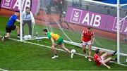 30 June 2024; Louth players Anthony Williams and Bevan Duffy, right, react after Eoghan Bán Gallagher of Donegal, centre, scored Donegal's first goal during the GAA Football All-Ireland Senior Championship quarter-final match between Donegal and Louth at Croke Park in Dublin. Photo by Piaras Ó Mídheach/Sportsfile