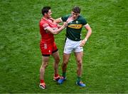 30 June 2024; Christopher McKaigue of Derry and David Clifford of Kerry tussle off the ball during the GAA Football All-Ireland Senior Championship quarter-final match between Kerry and Derry at Croke Park in Dublin. Photo by Piaras Ó Mídheach/Sportsfile