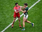30 June 2024; Christopher McKaigue of Derry and David Clifford of Kerry tussle off the ball during the GAA Football All-Ireland Senior Championship quarter-final match between Kerry and Derry at Croke Park in Dublin. Photo by Piaras Ó Mídheach/Sportsfile