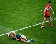 30 June 2024; David Clifford of Kerry reacts as Christopher McKaigue of Derry looks on during the GAA Football All-Ireland Senior Championship quarter-final match between Kerry and Derry at Croke Park in Dublin. Photo by Piaras Ó Mídheach/Sportsfile