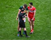30 June 2024; Referee David Coldrick in conversation with David Clifford of Kerry and Christopher McKaigue of Derry during the GAA Football All-Ireland Senior Championship quarter-final match between Kerry and Derry at Croke Park in Dublin. Photo by Piaras Ó Mídheach/Sportsfile