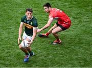 30 June 2024; David Clifford of Kerry in action against Christopher McKaigue of Derry during the GAA Football All-Ireland Senior Championship quarter-final match between Kerry and Derry at Croke Park in Dublin. Photo by Piaras Ó Mídheach/Sportsfile
