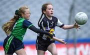 1 July 2024; Liby Kavanagh of St Kevins-Killian, Dublin, in action against Aoibheann McEneaney of Magheracloone, Monaghan, during the 2024 LGFA Go Games Activity Day at Croke Park in Dublin. Photo by Shauna Clinton/Sportsfile