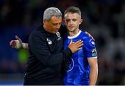 4 July 2024; Waterford manager Keith Long and Darragh Power of Waterford embrace after their side's victory in the SSE Airtricity Men's Premier Division match between Waterford and St Patrick's Athletic at the Regional Sports Centre in Waterford. Photo by Tyler Miller/Sportsfile