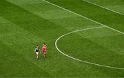 30 June 2024; David Clifford of Kerry and Christopher McKaigue of Derry during the GAA Football All-Ireland Senior Championship quarter-final match between Kerry and Derry at Croke Park in Dublin. Photo by Piaras Ó Mídheach/Sportsfile