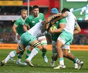 6 July 2024; Tadhg Beirne of Ireland is tackled by Ox Nche, Frans Malherbe and Damian de Allende of South Africa during the first test between South Africa and Ireland at Loftus Versfeld Stadium in Pretoria, South Africa. Photo by Brendan Moran/Sportsfile