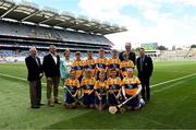 6 July 2024; Chairman of Cumann na mBunscol Joe Lyons, Uachtarán an Cumann Camógaíochta Brian Molloy, INTO President Carmel Browne, Uachtarán Chumann Lúthchleas Gael Jarlath Burns, President of Cumann na mBunscol Gary Farrell, with the Clare team, back row, left to right, DJ Leonard, Dromin NS, Dunleer, Louth, Gavin Devery, St Rynagh's NS, Banagher, Offaly, John Bloomer, St Brendan's NS, Portumna, Galway, Fionn Guinnessy, St Brendan's Boys NS, Loughrea, Galway, Mark Dennedy, Kinnitty NS, Kinnitty, Offaly, front row, left to right, Lúc Ó Madagáin, Gaelscoil na Cruaiche, Mhaigh Eo, Cillian Casey, Toreen NS, Mayo, Daithí McManus, CBS Primary, Keady Road, Armagh, Daniel Maher, Clonlisk NS, Shinrone, Offaly, Danny Kerry, Holy Family Senior School, Portlaoise, Laois, ahead of the GAA INTO Cumann na mBunscol Respect Exhibition Go Games at the GAA Hurling All-Ireland Senior Championship semi-final match between Kilkenny and Clare at Croke Park in Dublin. Photo by Daire Brennan/Sportsfile