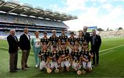 6 July 2024; Chairman of Cumann na mBunscol Joe Lyons, Uachtarán an Cumann Camógaíochta Brian Molloy, INTO President Carmel Browne, Uachtarán Chumann Lúthchleas Gael Jarlath Burns, President of Cumann na mBunscol Gary Farrell, with the Kilkenny team, back row, left to right, Conor Spollen, Stonepark NS, Stonepark, Longford, Bobby Murphy, Scoil Naomh Bríd, Cill Mhantáin, Rían Keating, Two Mile House NS, Naas, Kildare, Harry Brennan, St Aidan's NS, Kilmanagh, Kilkenny, Cionnaodh Murphy, Scoil San Treasa, Áth Cliath, front row, left to right, Donnacha Nolan, Scoil Mhuire, Newtownforbes, Longford, Conal Bairéid, GS na gCloch Liath, Cill Mhantáin, Mark Phelan, Scoil Mhuire, Gowran, Kilkenny, Conor Ó Ceallaigh, Sacred Heart NS, Clondalkin, Dublin, Anraí Ó Cinnéide, Gaelscoil Nás na Ríogh, Cill Dara, ahead of the GAA INTO Cumann na mBunscol Respect Exhibition Go Games at the GAA Hurling All-Ireland Senior Championship semi-final match between Kilkenny and Clare at Croke Park in Dublin. Photo by Daire Brennan/Sportsfile