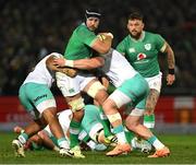 6 July 2024; Caelan Doris of Ireland is tackled by Damian de Allende and Vincent Koch of South Africa during the first test between South Africa and Ireland at Loftus Versfeld Stadium in Pretoria, South Africa. Photo by Brendan Moran/Sportsfile