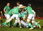 6 July 2024; Eben Etzebeth of South Africa is tackled by Josh van der Flier and Caelan Doris of Ireland during the first test between South Africa and Ireland at Loftus Versfeld Stadium in Pretoria, South Africa. Photo by Brendan Moran/Sportsfile