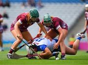 7 July 2024; Roisín Kirwin of Waterford is tackled by Roisín Black, left, and Áine Keane of Galway during the Glen Dimplex Senior Camogie All-Ireland Championship quarter-final match between Galway and Waterford at Croke Park in Dublin. Photo by Ray McManus/Sportsfile