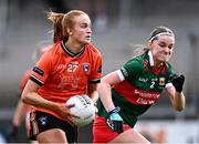 7 July 2024; Blaithín Mackin of Armagh in action against Saoirse Lally of Mayo during the TG4 All-Ireland Ladies Football Senior Championship quarter-final match between Armagh and Mayo at the BOX-IT Athletic Grounds in Armagh. Photo by Piaras Ó Mídheach/Sportsfile