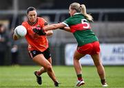 7 July 2024; Niamh Henderson of Armagh in action against Eilis Ronayne of Mayo during the TG4 All-Ireland Ladies Football Senior Championship quarter-final match between Armagh and Mayo at the BOX-IT Athletic Grounds in Armagh. Photo by Piaras Ó Mídheach/Sportsfile