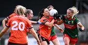 7 July 2024; Niamh Henderson of Armagh in action against Eilis Ronayne of Mayo, right, during the TG4 All-Ireland Ladies Football Senior Championship quarter-final match between Armagh and Mayo at the BOX-IT Athletic Grounds in Armagh. Photo by Piaras Ó Mídheach/Sportsfile