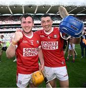 7 July 2024; Cork players Niall O'Leary, left, and Seán O'Donoghue celebrates after their side's victory in the GAA Hurling All-Ireland Senior Championship semi-final match between Limerick and Cork at Croke Park in Dublin. Photo by Seb Daly/Sportsfile