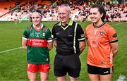 7 July 2024; Referee Brendan Rice with team captains Saoirse Lally of Mayo and Clodagh McCambridge of Armagh before the TG4 All-Ireland Ladies Football Senior Championship quarter-final match between Armagh and Mayo at the BOX-IT Athletic Grounds in Armagh. Photo by Piaras Ó Mídheach/Sportsfile