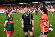 7 July 2024; Referee Brendan Rice performs the coin toss with team captains Saoirse Lally of Mayo and Clodagh McCambridge of Armagh before the TG4 All-Ireland Ladies Football Senior Championship quarter-final match between Armagh and Mayo at the BOX-IT Athletic Grounds in Armagh. Photo by Piaras Ó Mídheach/Sportsfile