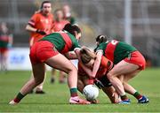 7 July 2024; Caroline O'Hanlon of Armagh in action against Aoife Geraghty, left, and Lucy Wallace of Mayo during the TG4 All-Ireland Ladies Football Senior Championship quarter-final match between Armagh and Mayo at the BOX-IT Athletic Grounds in Armagh. Photo by Piaras Ó Mídheach/Sportsfile