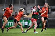 7 July 2024; Annie Gough of Mayo in action against Armagh players, from left, Clodagh McCambridge, Lauren McConville and Cáit Towe during the TG4 All-Ireland Ladies Football Senior Championship quarter-final match between Armagh and Mayo at the BOX-IT Athletic Grounds in Armagh. Photo by Piaras Ó Mídheach/Sportsfile