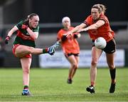 7 July 2024; Lucy Wallace of Mayo has her kick blocked down by Caroline O'Hanlon of Armagh during the TG4 All-Ireland Ladies Football Senior Championship quarter-final match between Armagh and Mayo at the BOX-IT Athletic Grounds in Armagh. Photo by Piaras Ó Mídheach/Sportsfile