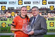 7 July 2024; Blaithín Mackin of Armagh is presented with the Player of the Match award by Hugh Devenney, on behalf of the LGFA, during the TG4 All-Ireland Ladies Football Senior Championship quarter-final match between Armagh and Mayo at the BOX-IT Athletic Grounds in Armagh. Photo by Piaras Ó Mídheach/Sportsfile