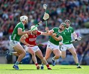7 July 2024; Patrick Horgan of Cork is tackled by Niall O'Leary and Mark Coleman of Cork during the GAA Hurling All-Ireland Senior Championship semi-final match between Limerick and Cork at Croke Park in Dublin. Photo by Ray McManus/Sportsfile