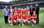 7 July 2024; The Cork boys team, back row from left, Bobby Flynn, St Kevin's Boys School, Kilnamanagh, Dublin, Gary O'Mahony, Killury NS, Causeway, Kerry, Conor Barron, Clonmoney NS, Newmarket on Fergus, Clare, and Eoghan Ware, St Mary's BNS, Lucan, Dublin, front row from left, Eoin Cullen, Scoil Naomh Bríde, Blackwater, Wexford, Ben Donovan, Abbeydorney NS, Abbeydorney, Kerry, Páidí Slevin, St Colman's NS, Mullingar, Westmeath, Colm Hosford, Scoil na Spioraid Naoimh Boys, Cork, Darragh Moloney, Ballinspittle NS, Ballinspittle, Cork, and Jack Fitzpatrick, Sixmilebridge NS, Sixmilebridge, Clare, with Munster Council chairman Ger Ryan, INTO President Carmel Browne, President of Cumann na mBunscol Gary Farrell, and Uachtarán an Cumann Camógaíochta Brian Molloy, before the GAA INTO Cumann na mBunscol Respect Exhibition Go Games held before the GAA Hurling All-Ireland Senior Championship Semi-Final between Limerick and Cork at Croke Park in Dublin. Photo by Seb Daly/Sportsfile