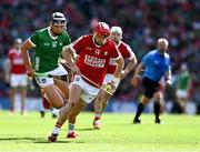 7 July 2024; Alan Connolly of Cork races clear of Gearóid Hegarty of Limerick during the GAA Hurling All-Ireland Senior Championship semi-final match between Limerick and Cork at Croke Park in Dublin. Photo by Ray McManus/Sportsfile