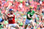 7 July 2024; Sean O'Donoghue of Cork and Seamus Flanagan of Limerick during the GAA Hurling All-Ireland Senior Championship semi-final match between Limerick and Cork at Croke Park in Dublin. Photo by Stephen McCarthy/Sportsfile