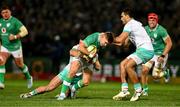 6 July 2024; Jack Crowley of Ireland is tackled by Jesse Kriel and Damian de Allende of South Africa during the first test between South Africa and Ireland at Loftus Versfeld Stadium in Pretoria, South Africa. Photo by Brendan Moran/Sportsfile