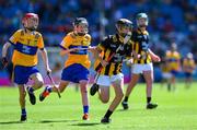 6 July 2024; Mark Phelan, Scoil Mhuire, Gowran, Kilkenny, representing Kilkenny in action against John Bloomer, St Brendan's NS, Portumna, Galway, representing Clare and Cillian Casey, Toreen NS, Mayo, representing Clare during the GAA INTO Cumann na mBunscol Respect Exhibition Go Games at the GAA Hurling All-Ireland Senior Championship semi-final match between Kilkenny and Clare at Croke Park in Dublin. Photo by Ray McManus/Sportsfile
