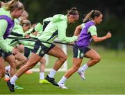 9 July 2024; Caitlin Hayes and Katie McCabe, right, during a Republic of Ireland women's training session at the FAI National Training Centre in Abbotstown, Dublin. Photo by Stephen McCarthy/Sportsfile