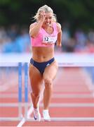 9 July 2024; Molly Scott of Ireland, centre, competing in the Cork Airport 200m women's Hurdles final during the Cork City Sports at MTU Athletics Track in Cork. Photo by Tyler Miller/Sportsfile