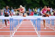 9 July 2024; Molly Scott of Ireland, centre, competing in the Cork Airport 200m women's Hurdles final during the Cork City Sports at MTU Athletics Track in Cork. Photo by Tyler Miller/Sportsfile