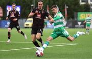 9 July 2024; Trevor Clarke of Shamrock Rovers in action against Karl Gunnarsson of Vikingur Reykjavik during the UEFA Champions League First Qualifying Round First Leg match between Vikingur Reykjavik and Shamrock Rovers at Víkingsvöllur in Reykjavik, Iceland. Photo by Haflidi Breidfjord/Sportsfile