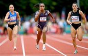 9 July 2024; Celera Barnes of USA, centre, leads the field in the Centra 100m women's final during the Cork City Sports at MTU Athletics Track in Cork. Photo by Tyler Miller/Sportsfile