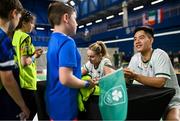 10 July 2024; Nhat Nguyen with fans during the Team Ireland Paris 2024 team training for Badminton at the National Indoor Arena on the Sport Ireland Campus in Dublin. Photo by David Fitzgerald/Sportsfile